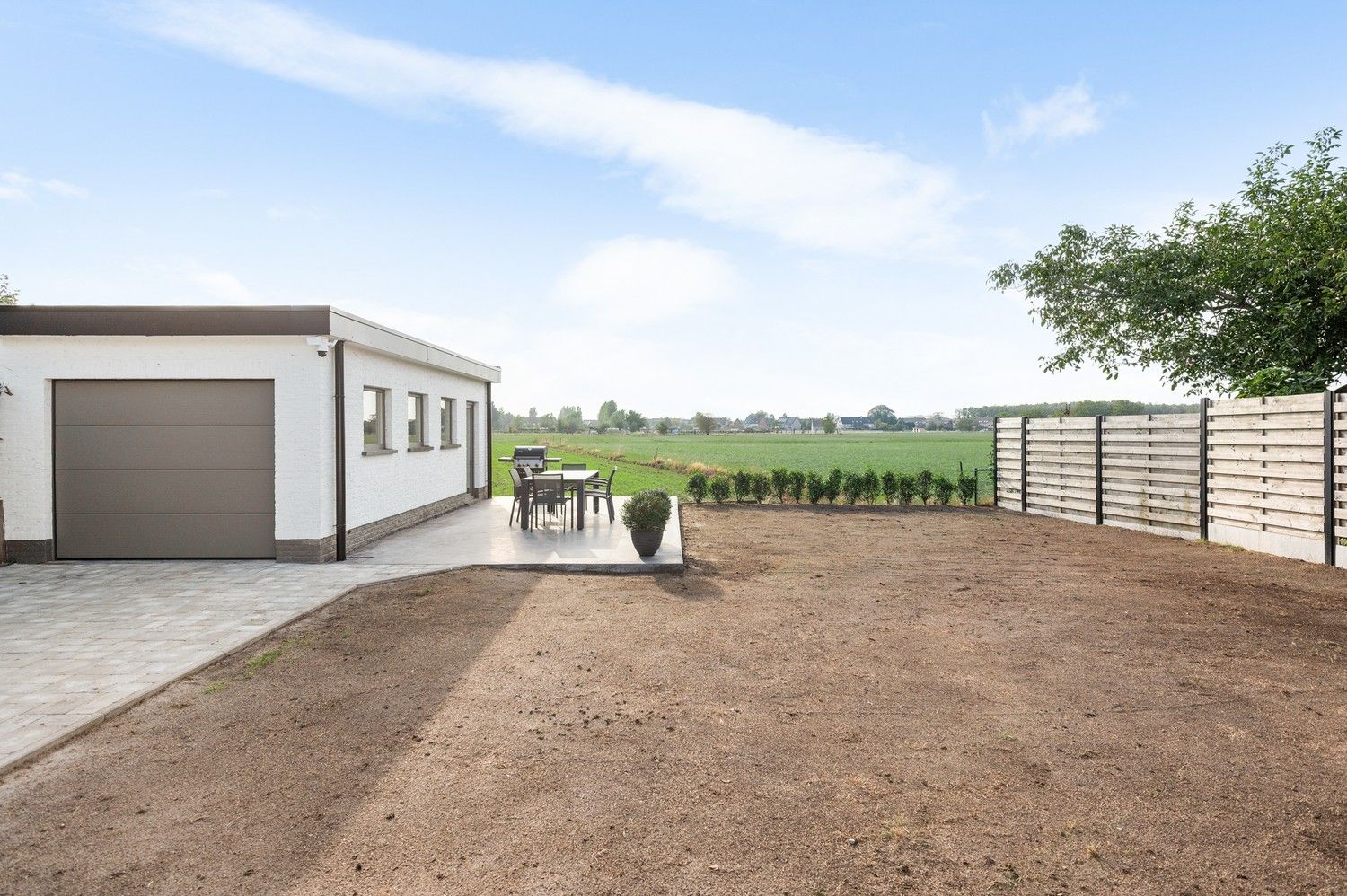 Prachtige totaalrenovatie met 2 à 3 SLPKS en een ruime tuin in Kapellen! foto 17