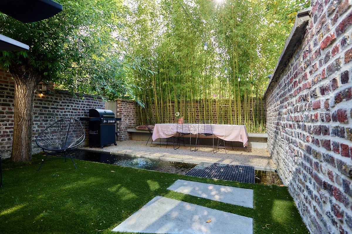 Buitengewone interbellum architecten-burgerwoning met tuin die omgevormd werd tot een hedendaagse luxueuze concept-woning. foto 36
