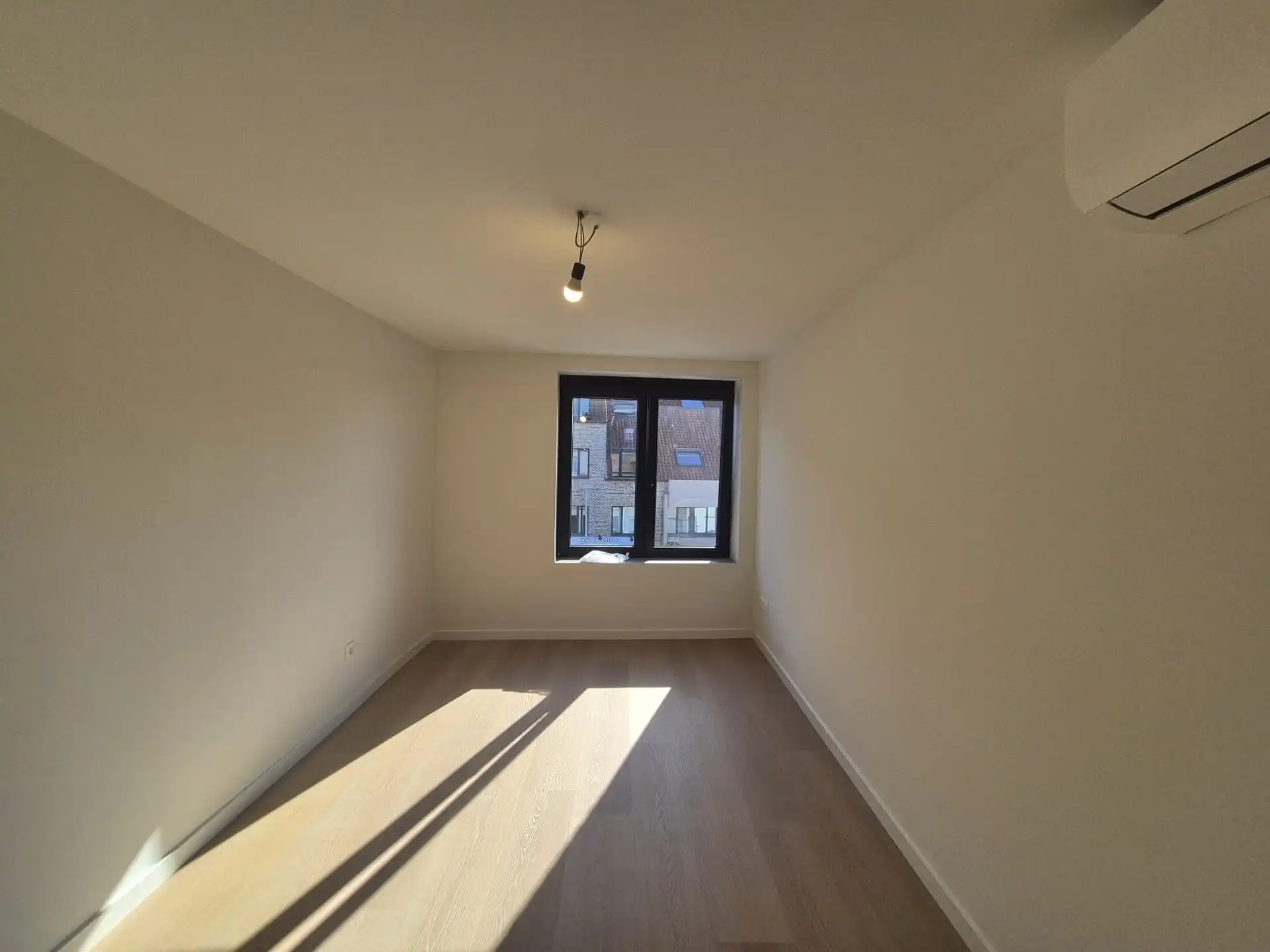 Ruim triplex appartement met polyvalente ruimte op toplocatie in het hart van Wetteren foto 16