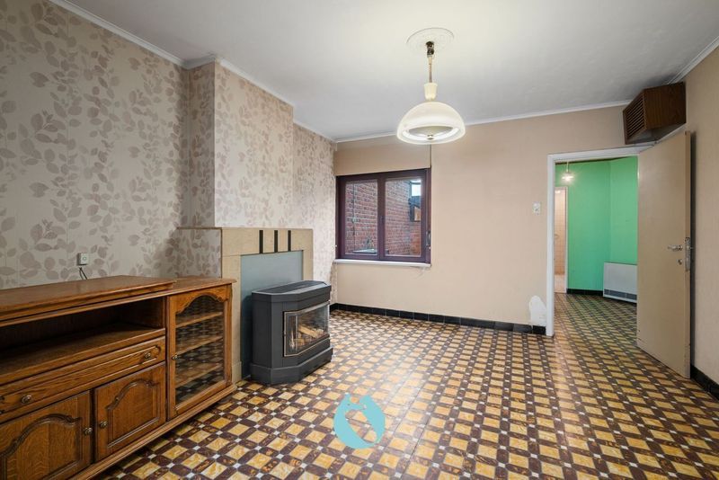 Te renoveren woning in het hart van Ertvelde - unieke investeringskans! foto 4