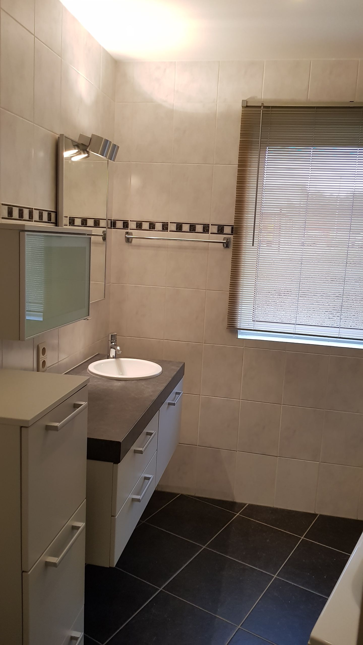 Modern gelijkvloers appartement te huur in Leuven foto 7