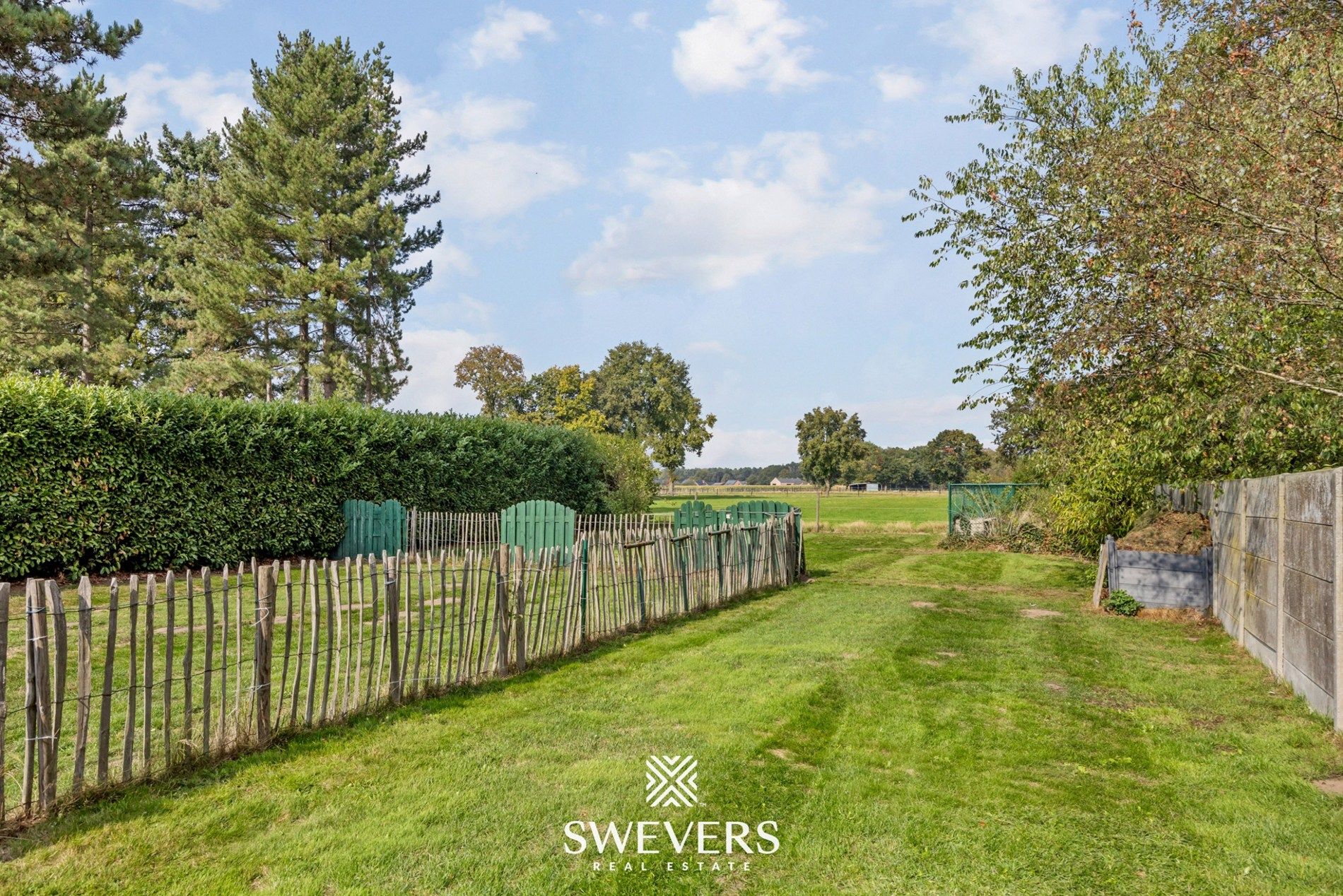 Instapklare gezinswoning met ruimte, tuin en rendement in Leopoldsburg foto 23