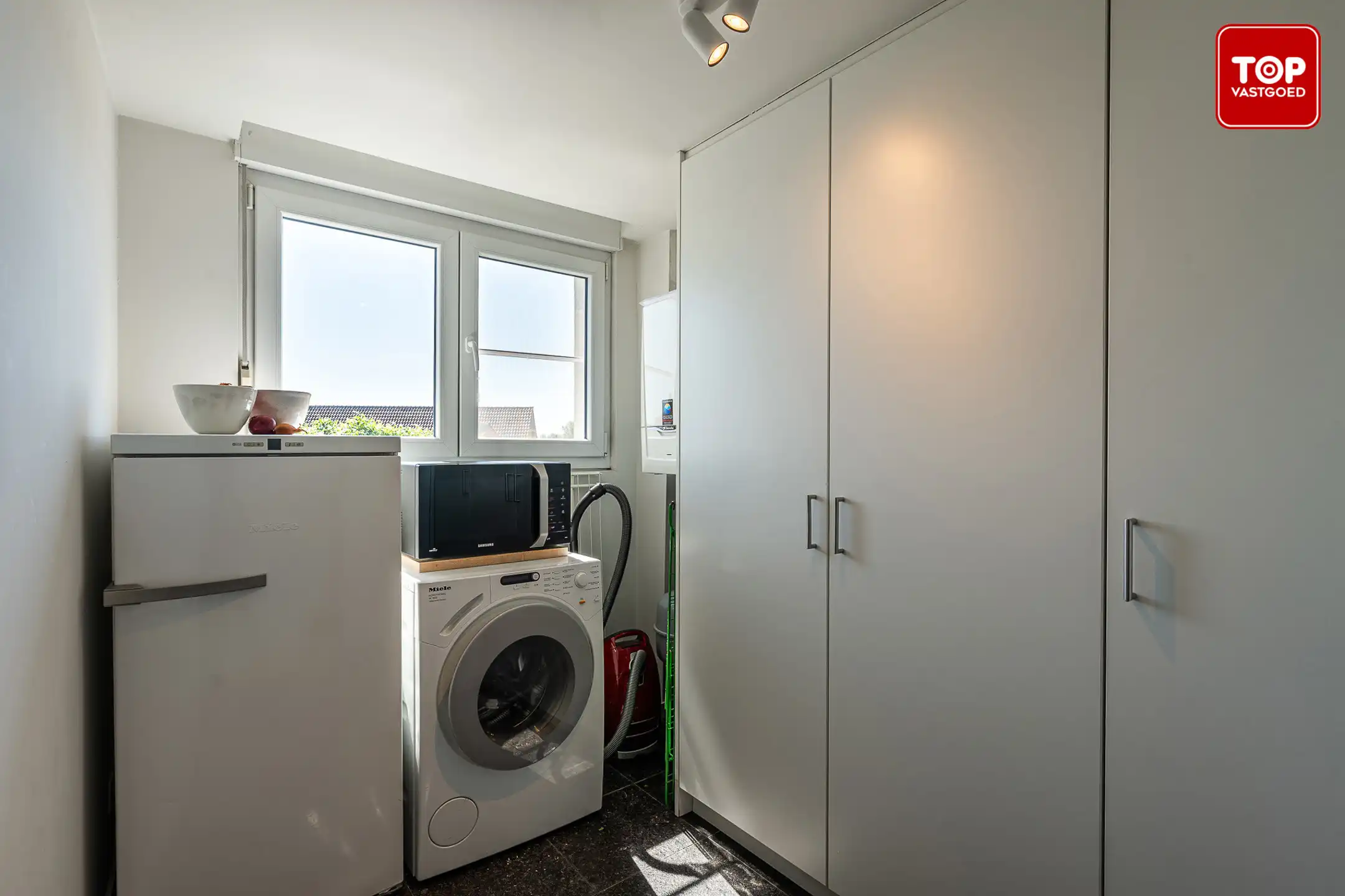Instapklare combinatie van handelsgelijkvloers en bel-etagewoning op een uiterst gunstige locatie. foto 31