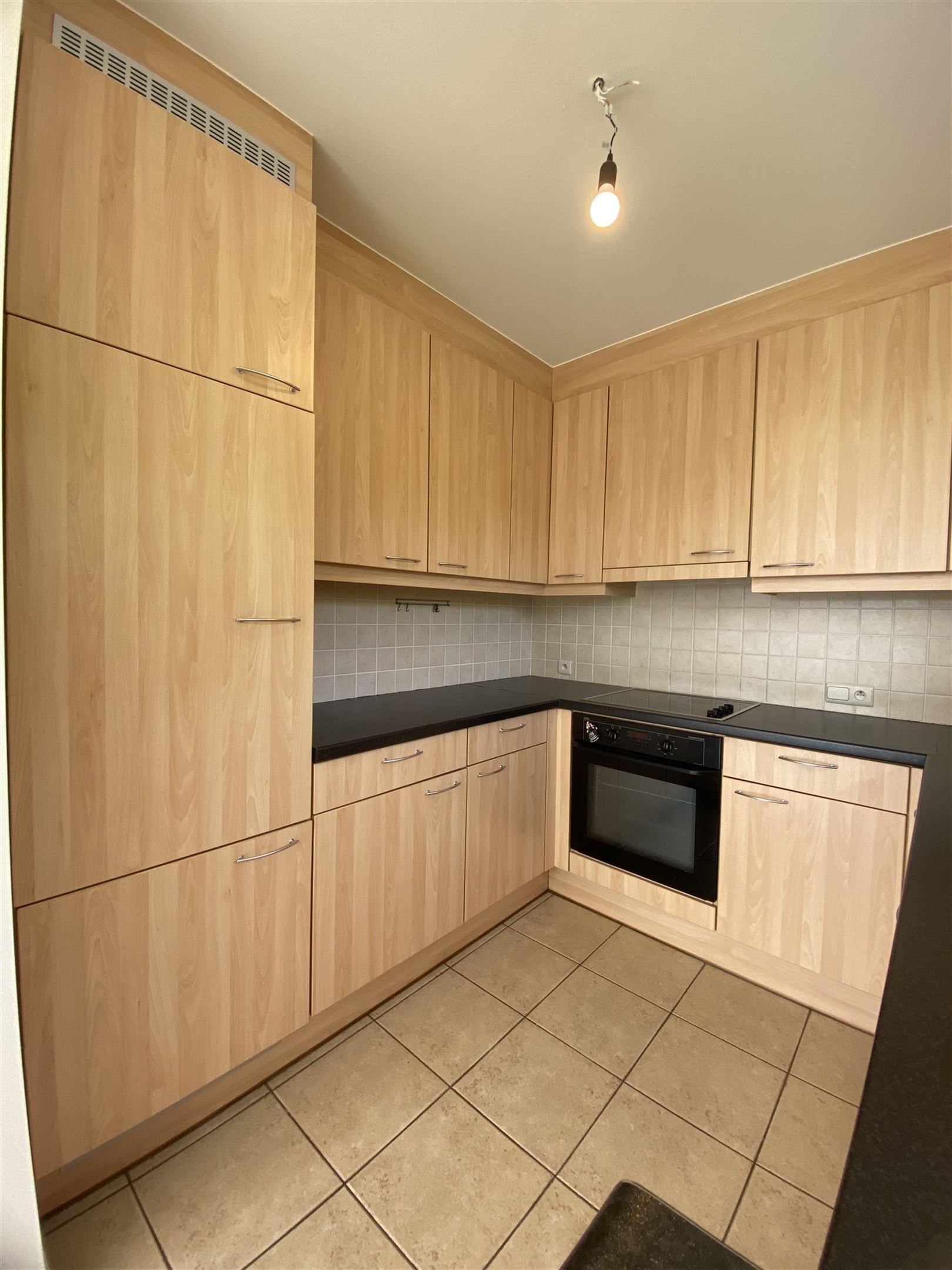 gelijkvloers appartement met garage foto 4