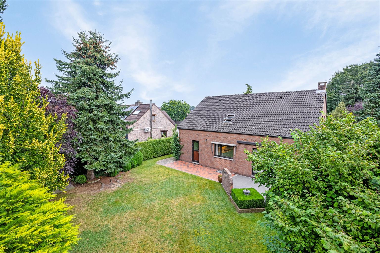 Charmante woning met 4 slaapkamers, prachtige tuin en inpandige garage, gelegen op een perceel van 8a4ca in het hart van Gruitrode. foto 32