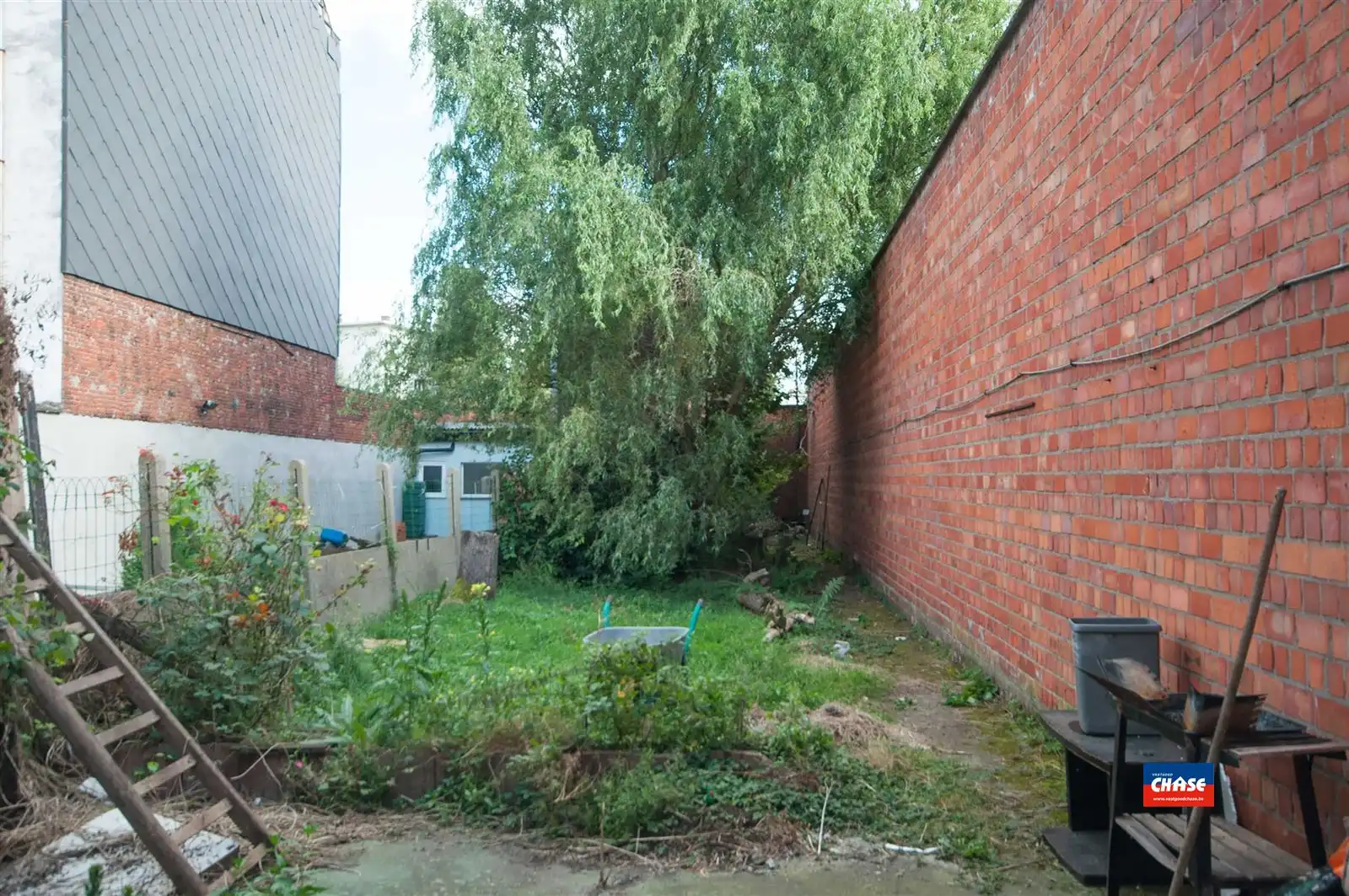 Gelijkvloersappartement met 1 grote slaapkamer en ruime tuin foto 12