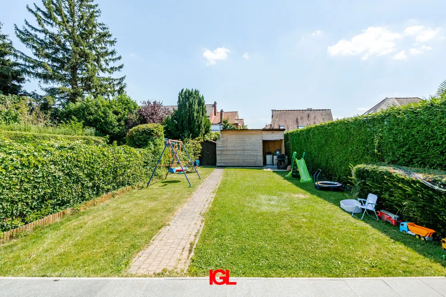 3-gevel woning met zuidgerichte tuin en garage foto 16