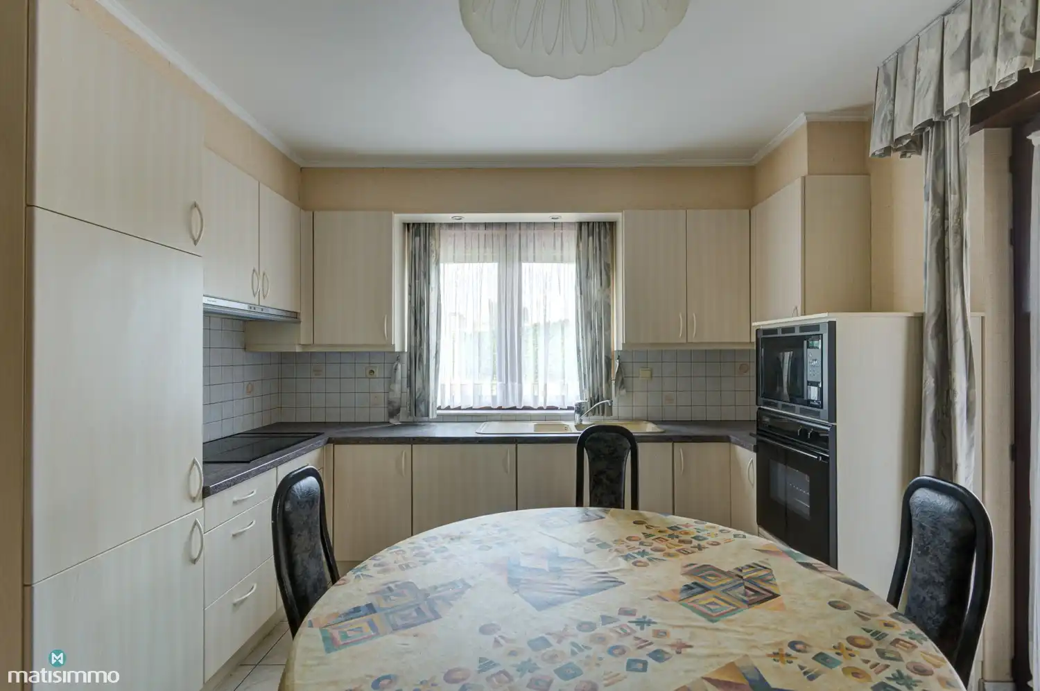 MEERSGEZINSWONING (2 APP.) MET 2 GARAGES, KELDER, ZOLDER EN RUIME TUIN IN MUNSTERBILZEN foto 9