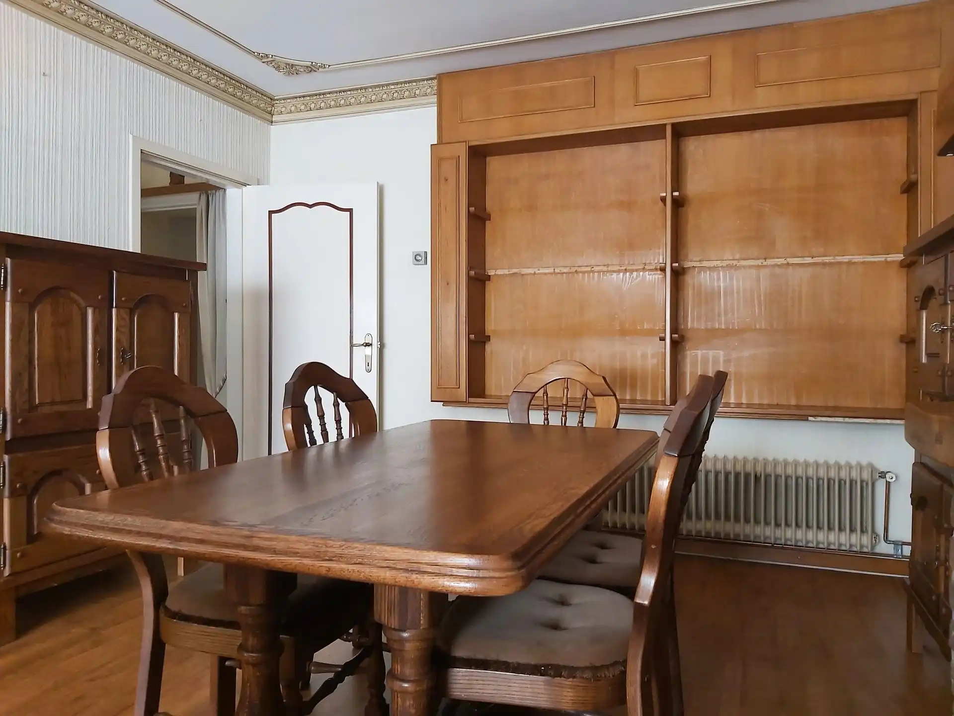 Te renoveren woning met 3 slaapkamers, garage en tuin in Maasmechelen! foto 5