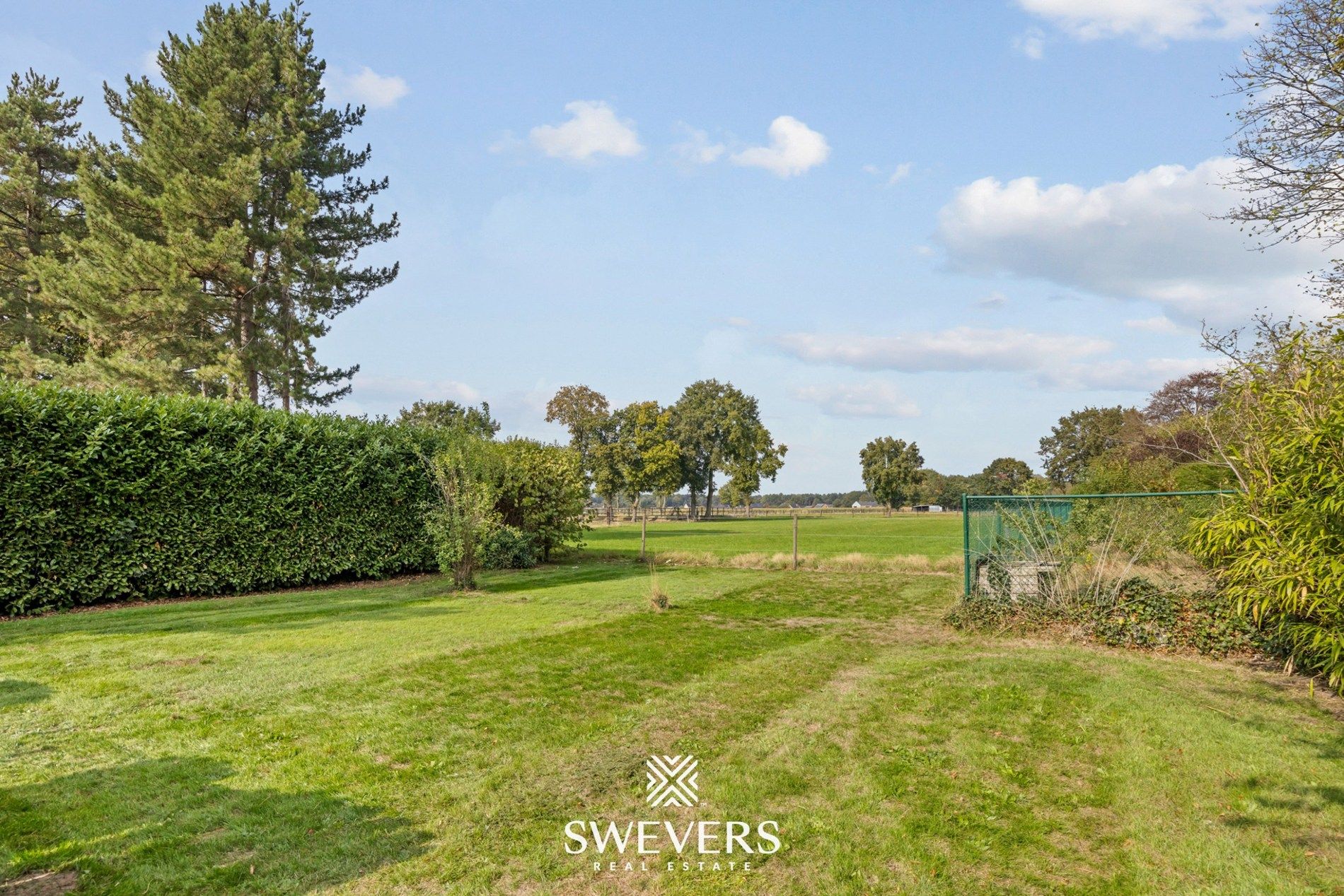 Instapklare gezinswoning met ruimte, tuin en rendement in Leopoldsburg foto 22