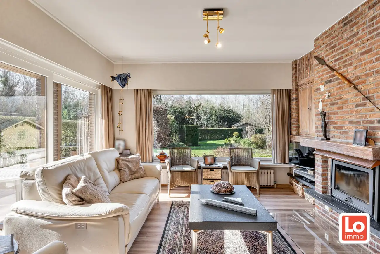 Degelijke open gelijkvloerse woning met inpandige garage en grote tuin op een groene toplocatie in Beervelde! foto 13