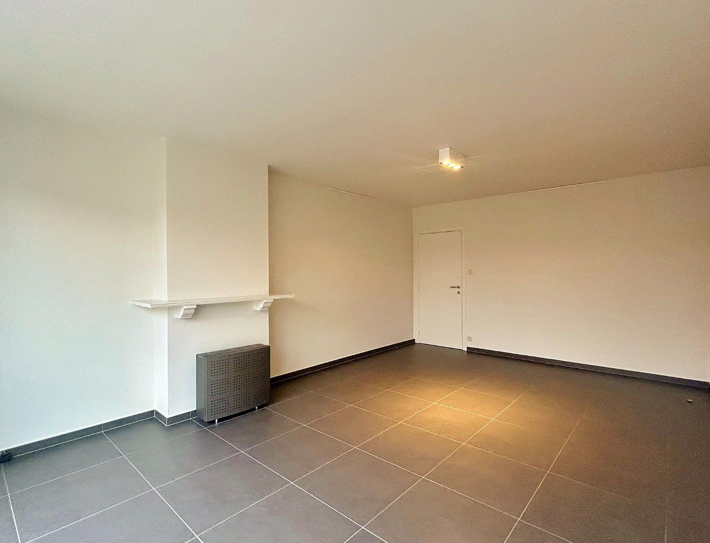 Lichtrijk en gerenoveerd appartement in het centrum van Ieper  foto 4