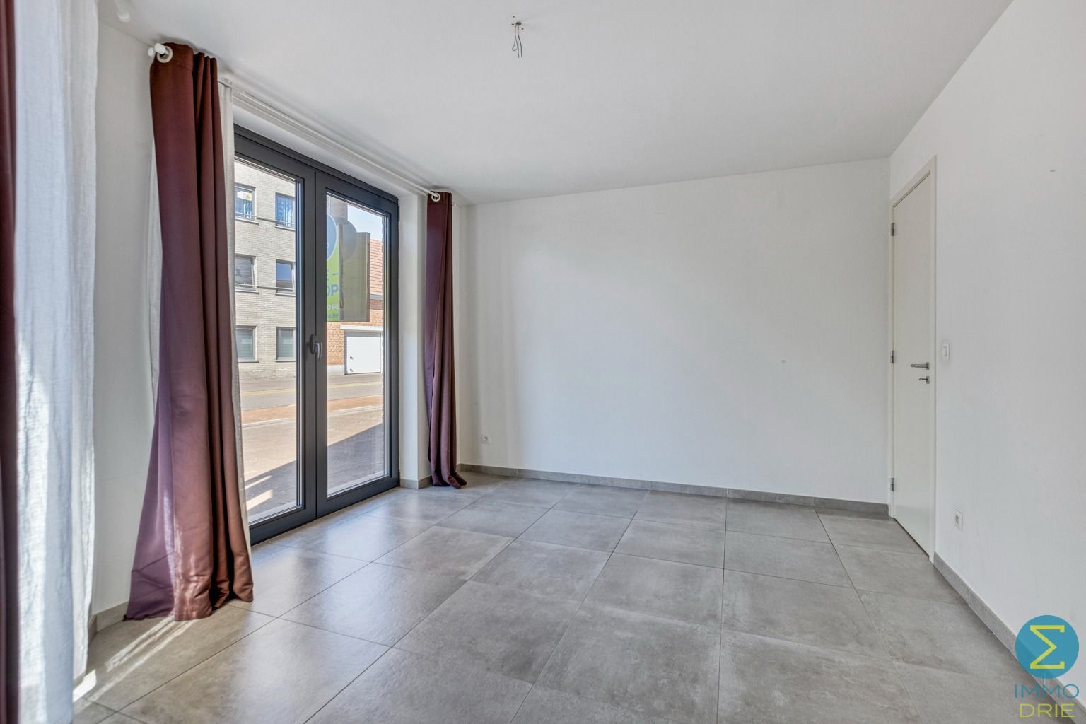 Centraal gelegen ruim gelijkvloers appartement met garage foto 9