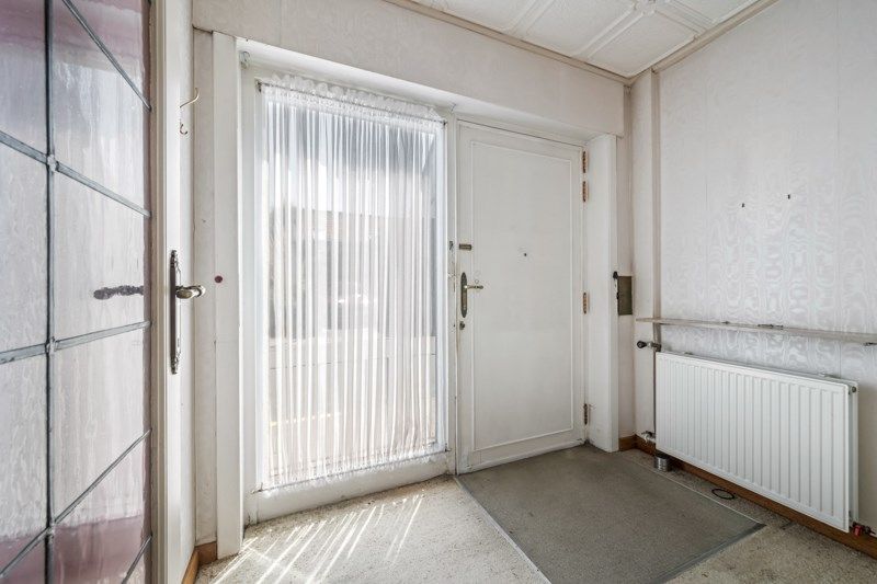 Ruime woning met veel potentieel – 4 slpks, tuin & garage foto 2