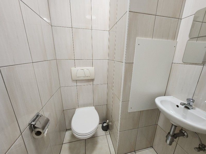 Tweeslaapkamer appartement mét garage in het centrum van Sint-Baafs-Vijve ZONDER SYNDICKOSTEN! foto 9