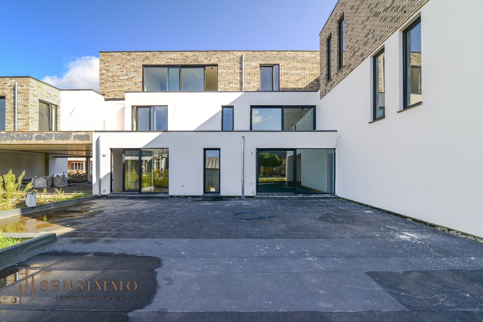 Nieuwbouwproject: 12 appartementen en 3 woningen foto 3