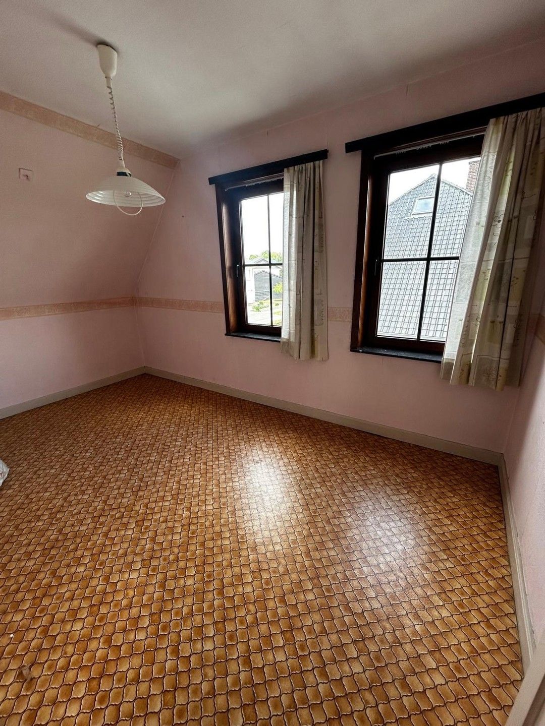 Charmante woning op een ruim hoekperceel in rustige omgeving foto 21
