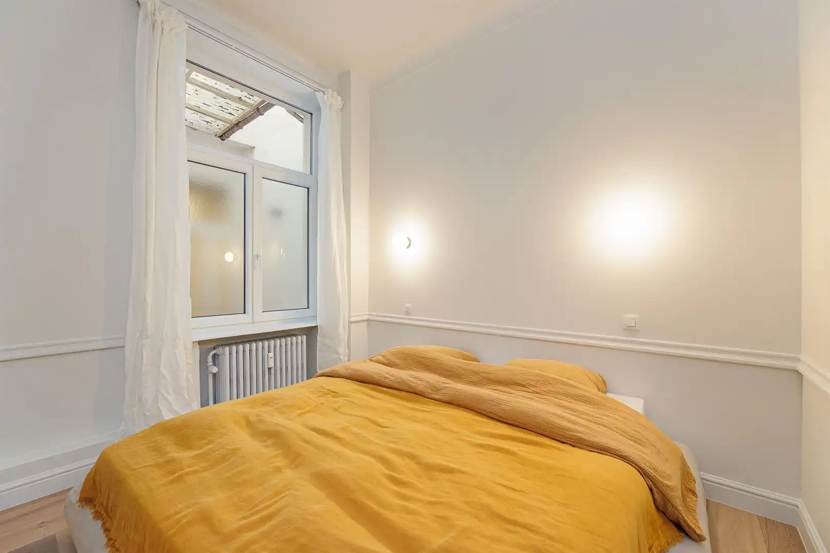 Gerenoveerd 2-slaapkamer appartement foto 10