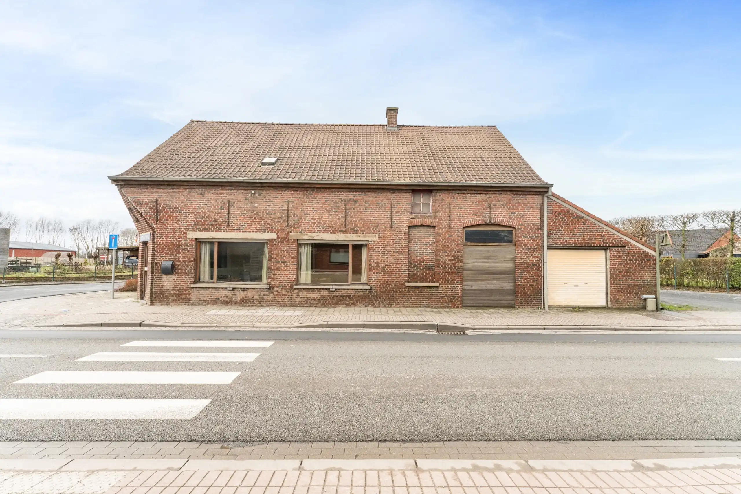 Voormalig te renoveren handelspand met woonst foto 3