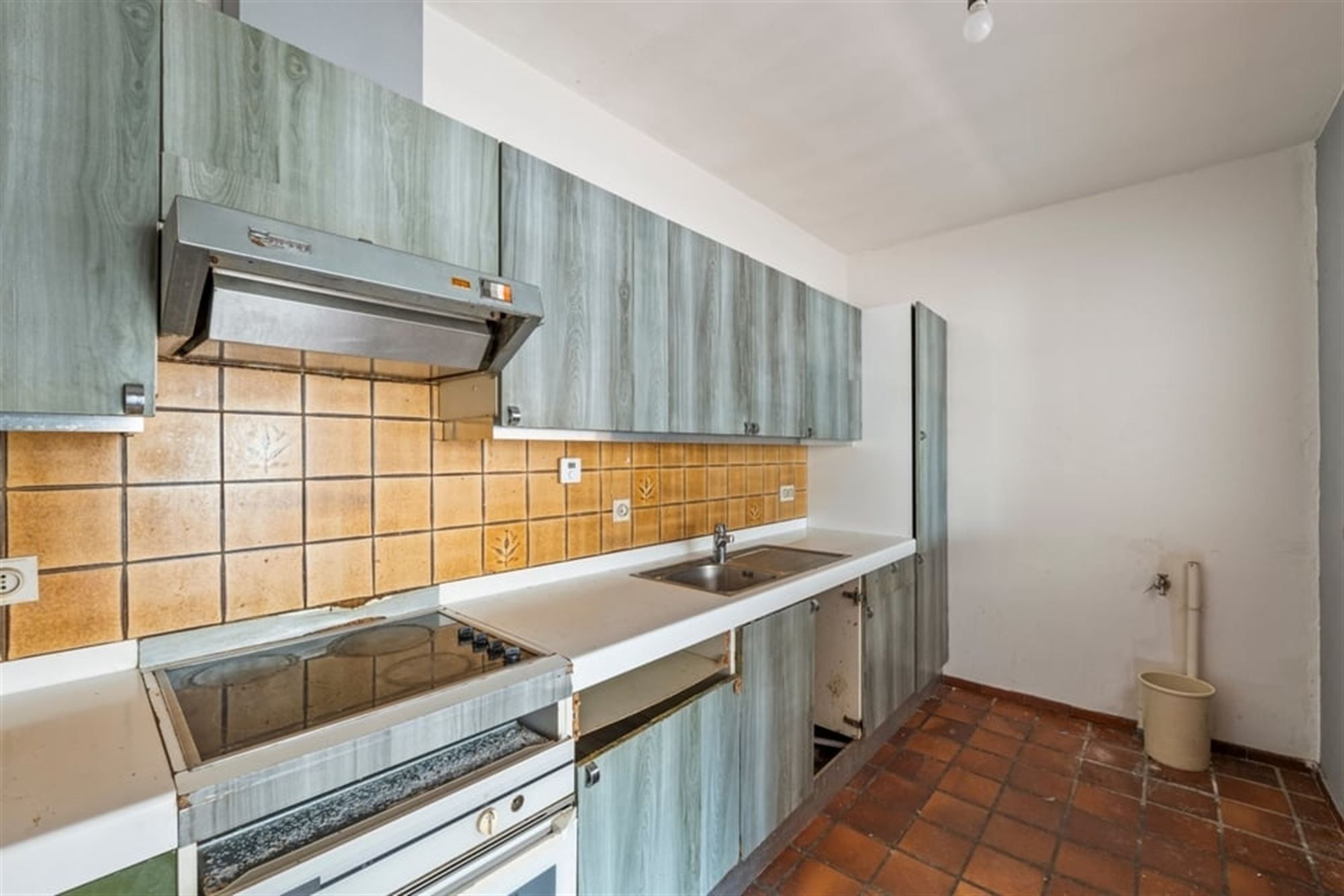 OPBRENGSTEIGENDOM MET 6 APPARTEMENTEN EN 4 STAANPLAATSEN IN SINT-TRUIDEN  foto 20