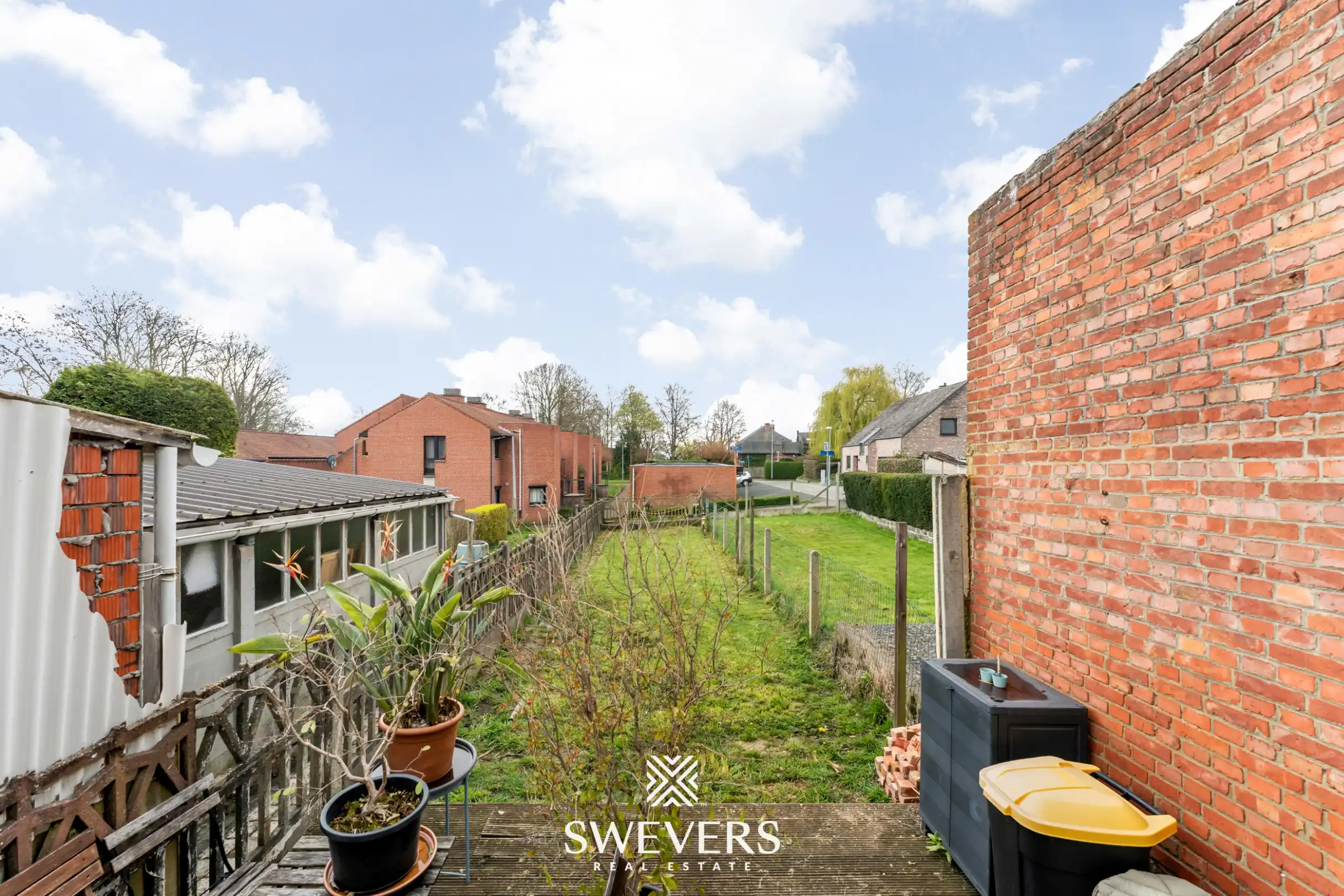 Instapklare stadswoning met zonnige tuin op toplocatie nabij centrum Leuven foto 21
