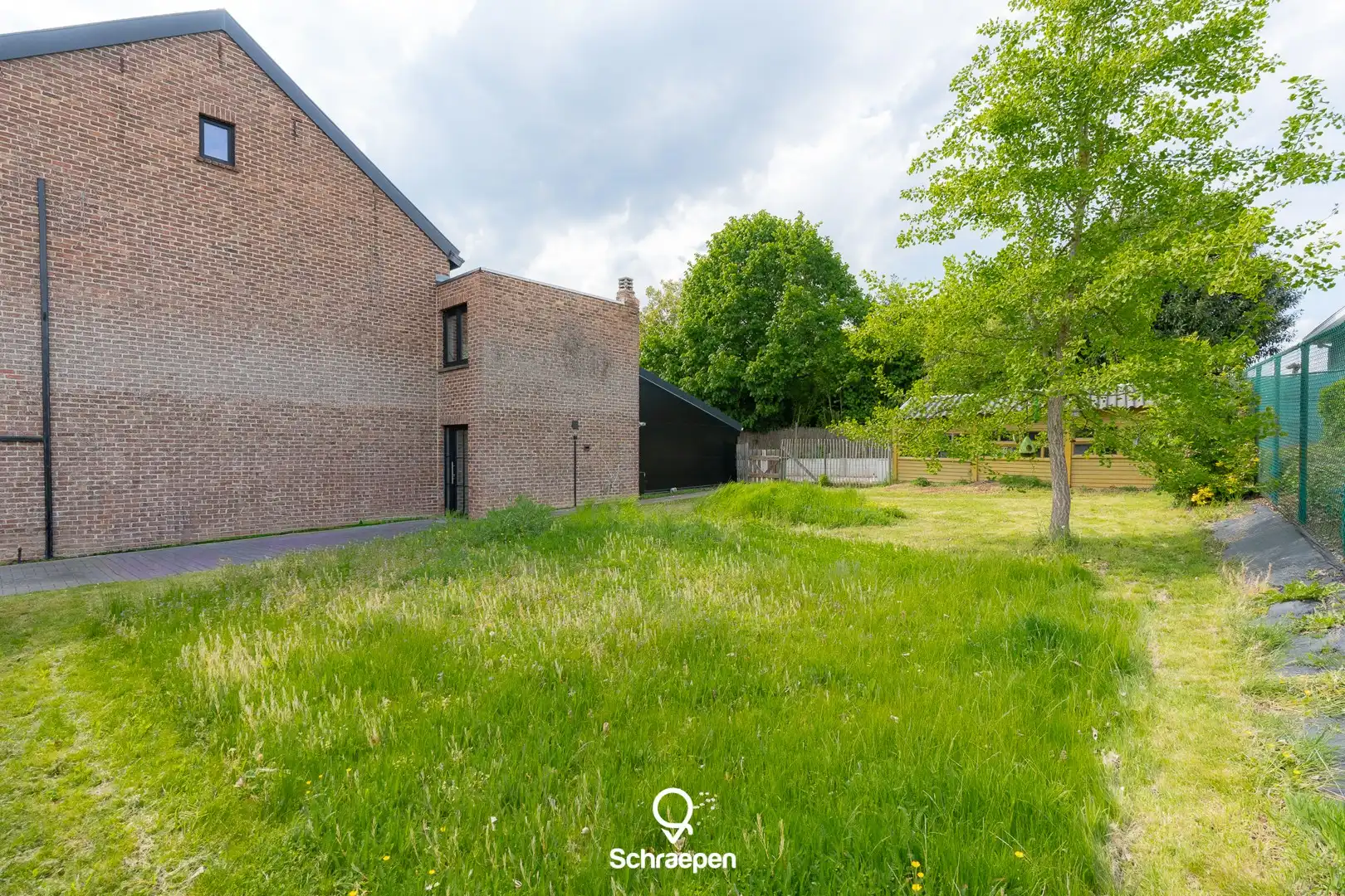 Ruime gezinswoning (248 m²) op een perceel van 5a 27ca te Borgloon! foto 4