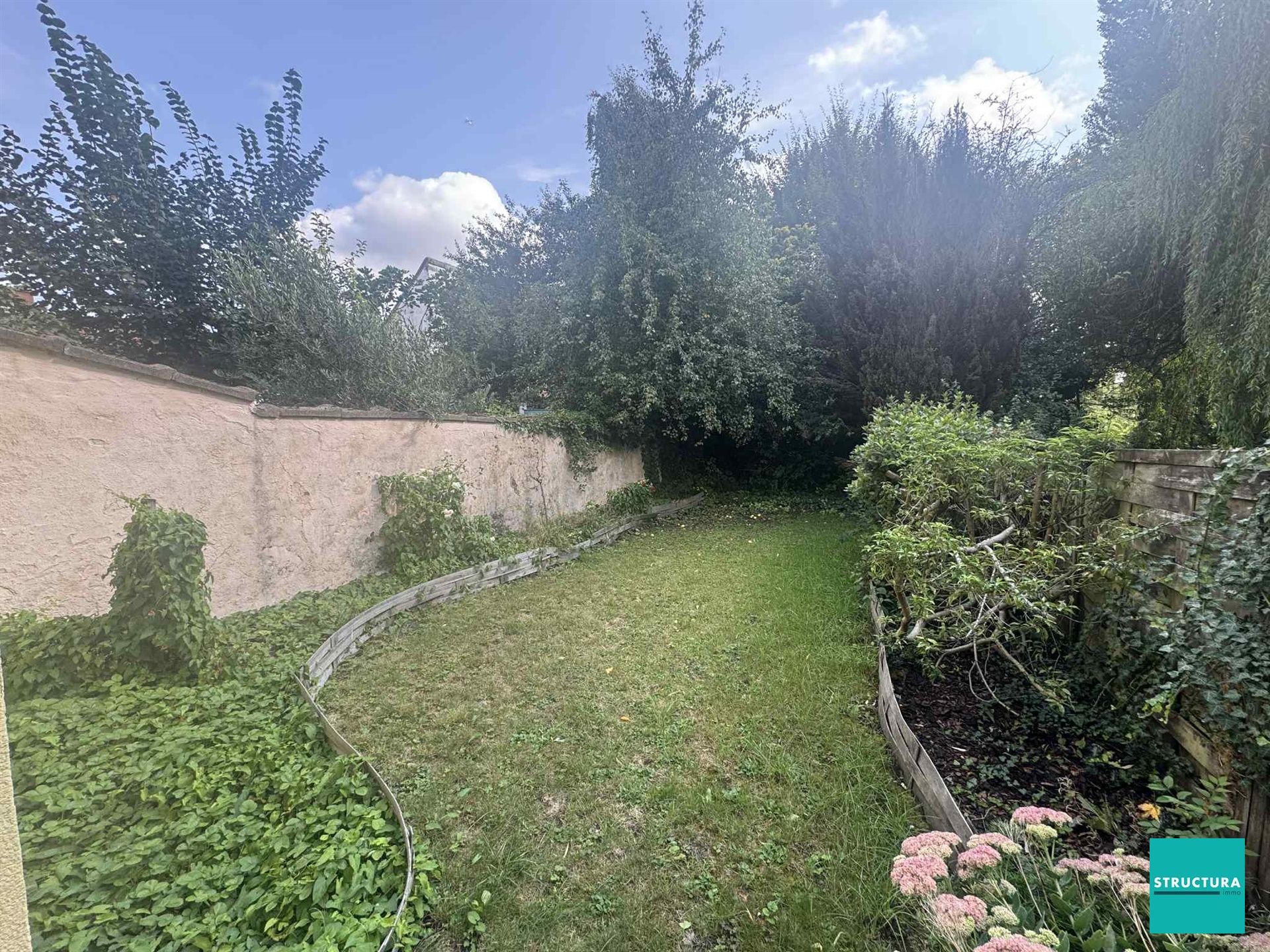 Gelijkvloerse handelsruimte met terras/tuin te huur RUE DE WAND. foto 6