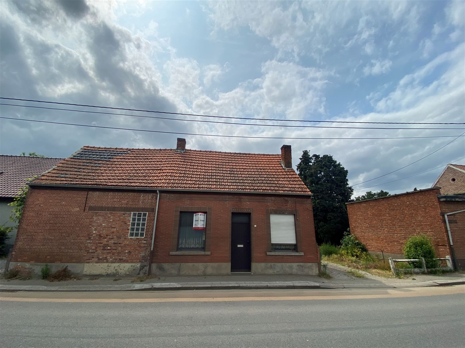 Af te breken woning op mooi perceel bouwgrond foto 2