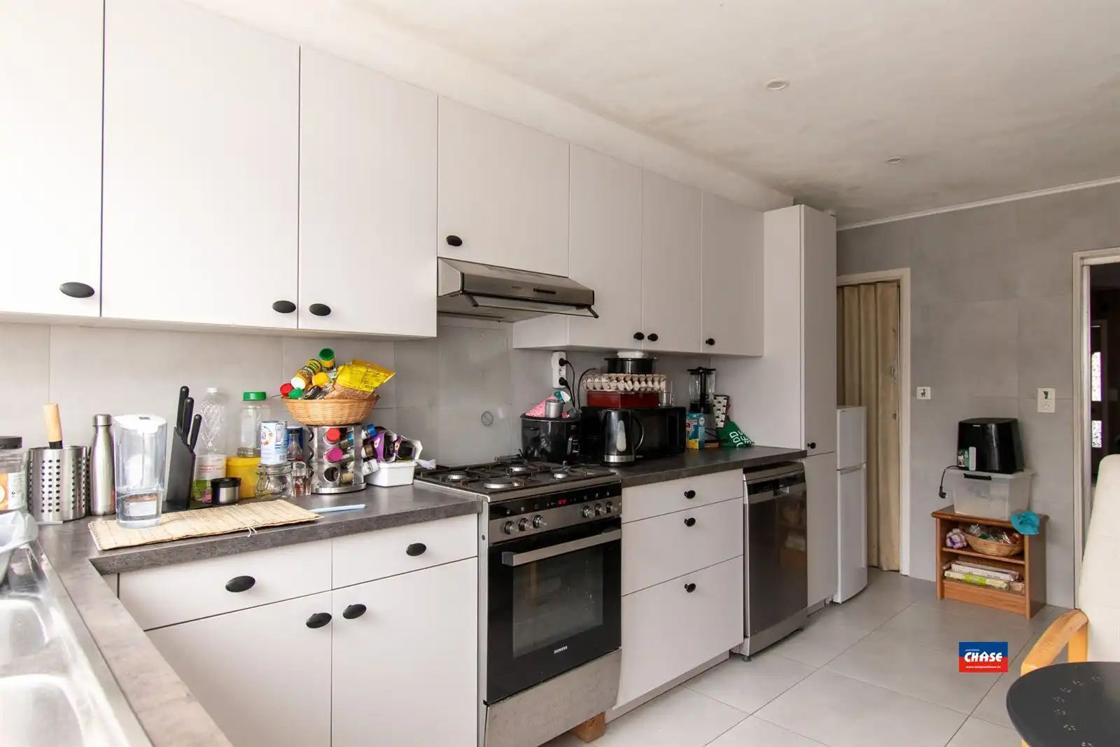Op te frissen woning met 3 slpks, zolder en tuin foto 6
