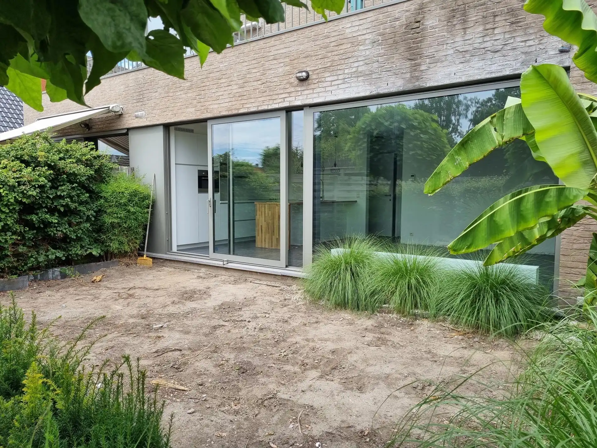 Knap gelijkvloers éénslaapkamerappartement met tuin en garagebox. foto 19