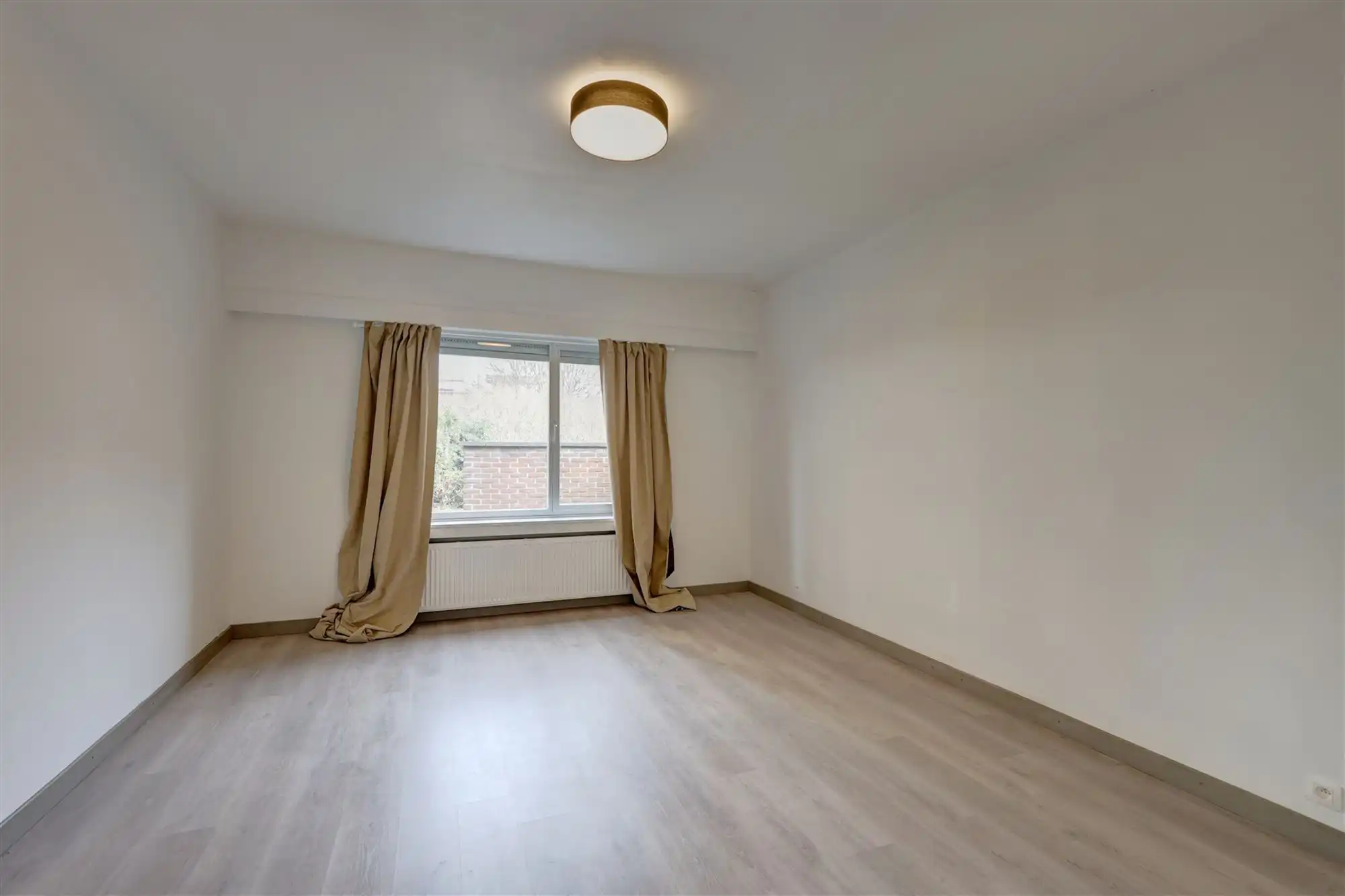 Gelijkvloers appartement met 4 slaapkamers en tuin in centrum Wilrijk foto 4