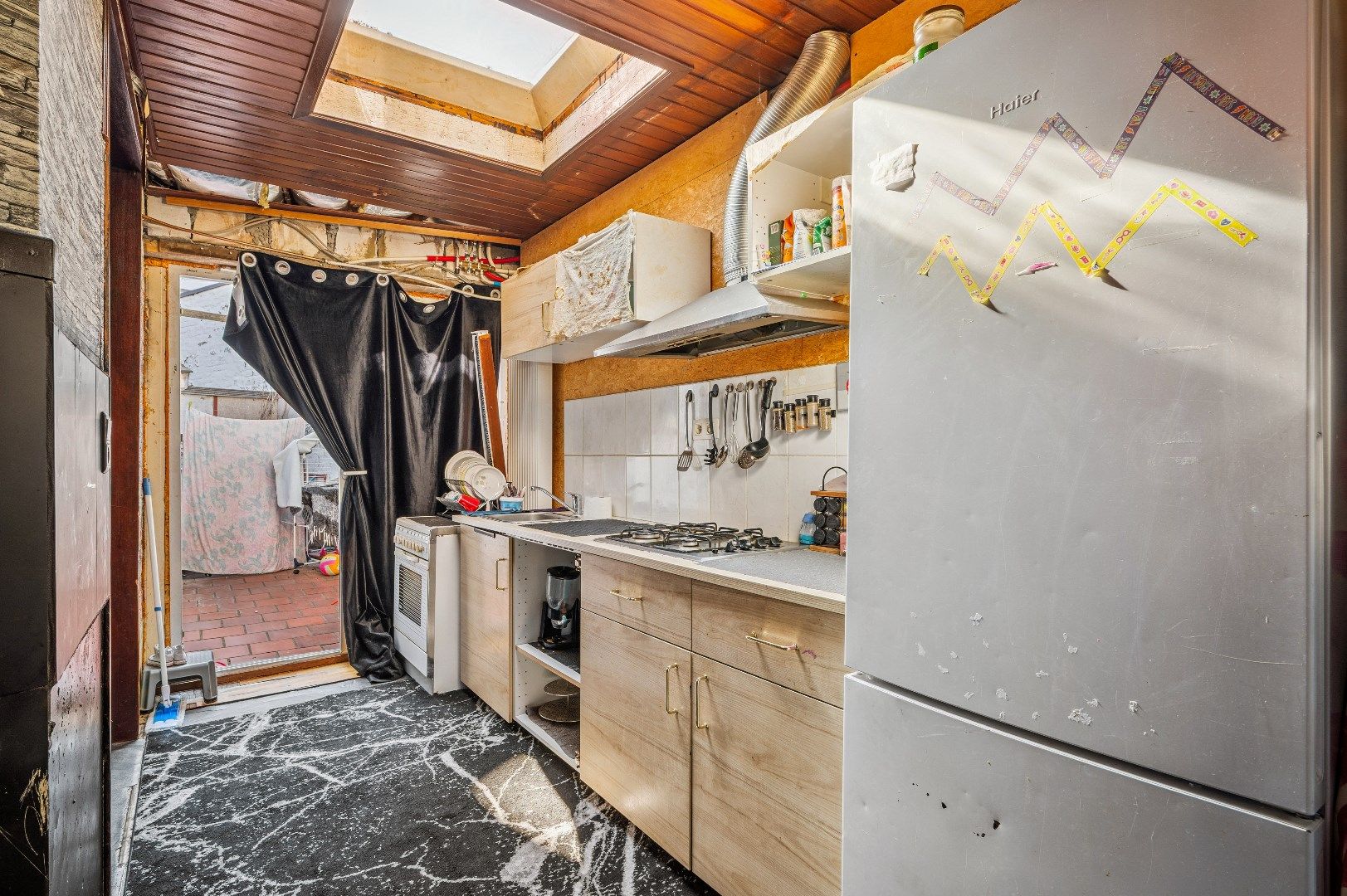 Te renoveren rijwoning met potentieel in de buitenrand van Tienen foto 9
