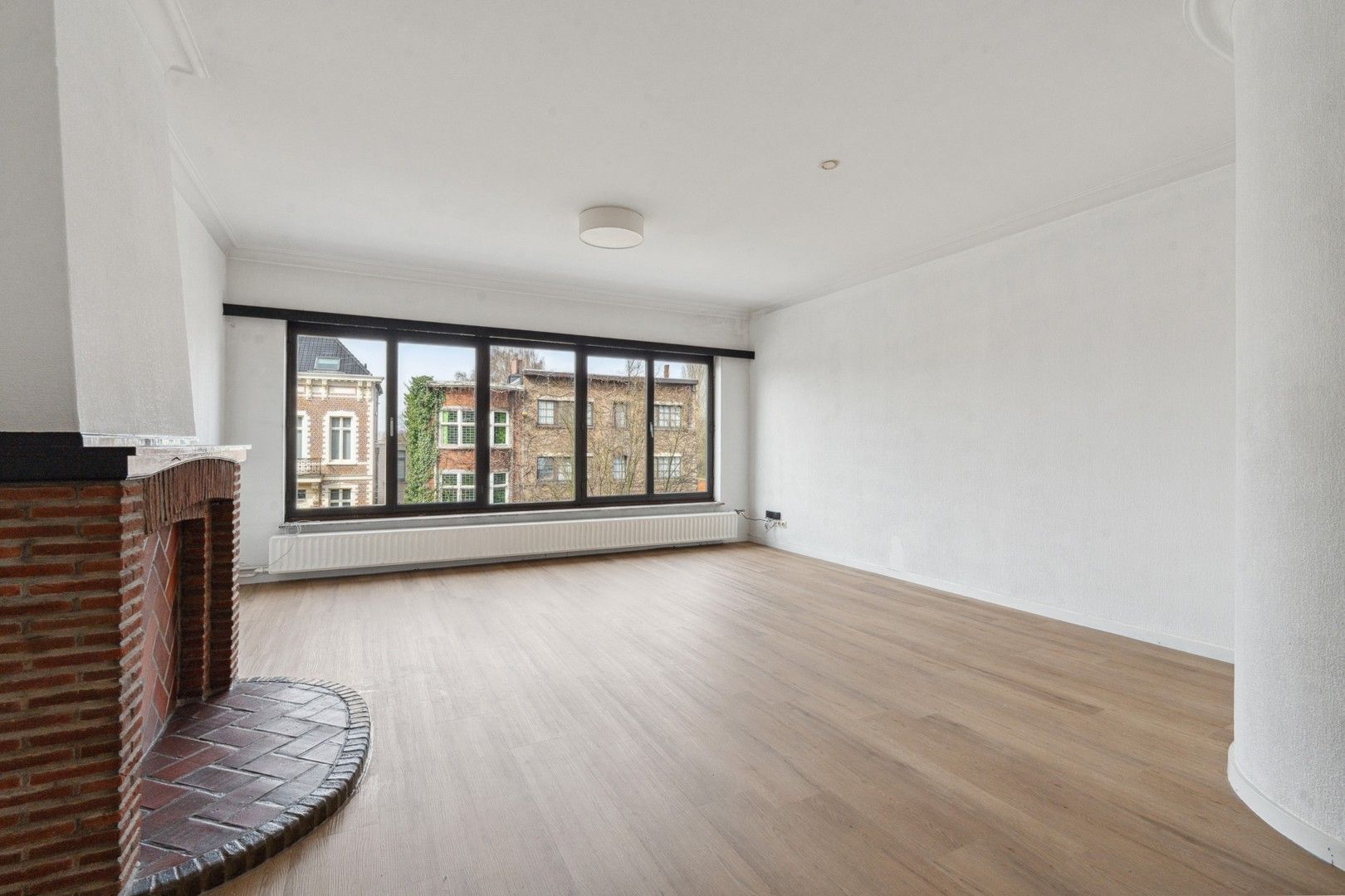 Opbrengsteigendom met tuin en 2 appartementen te koop foto 4