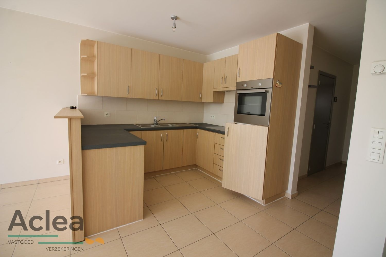 gezellig gelijkvloers appartement met terras foto 3