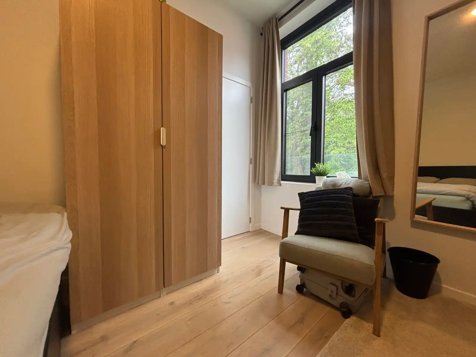 Bemeubelde kamer privatief sanitair Leuven foto 3