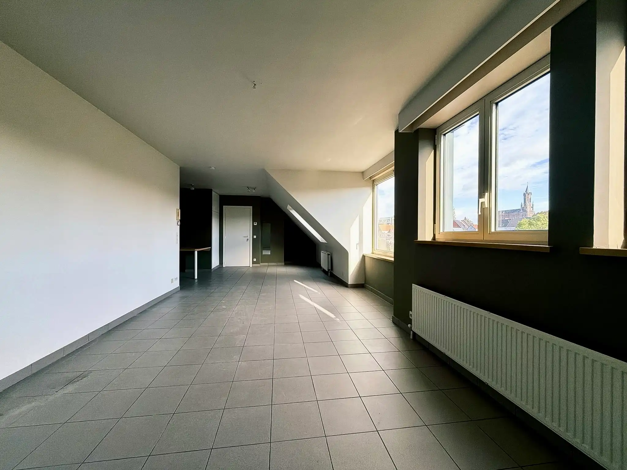 Centraal gelegen 1-slpk appartement te huur in Wetteren foto 8