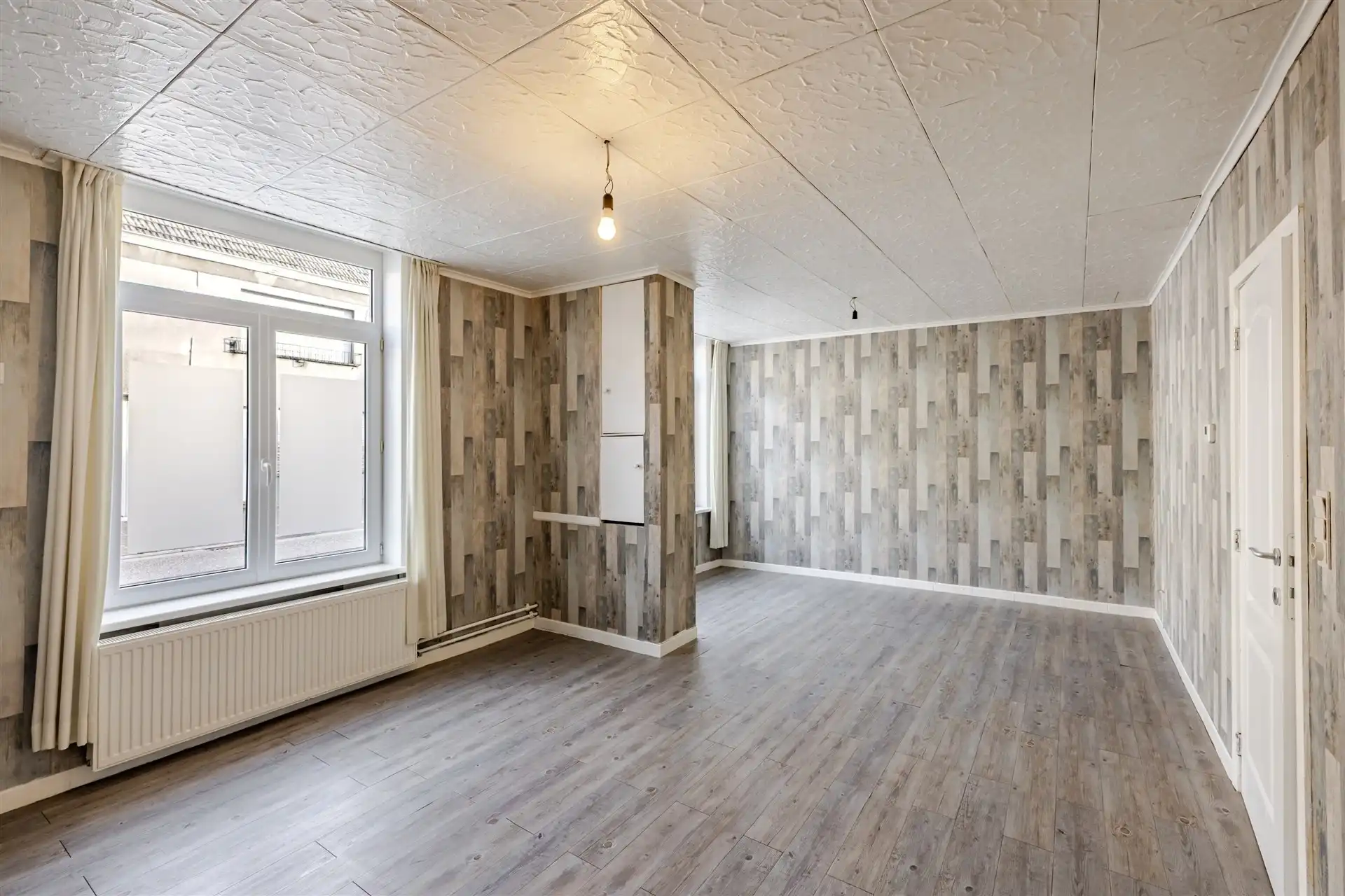 Goed gelegen, deels, te renoveren woning, centrum Asper(Gavere) foto 7