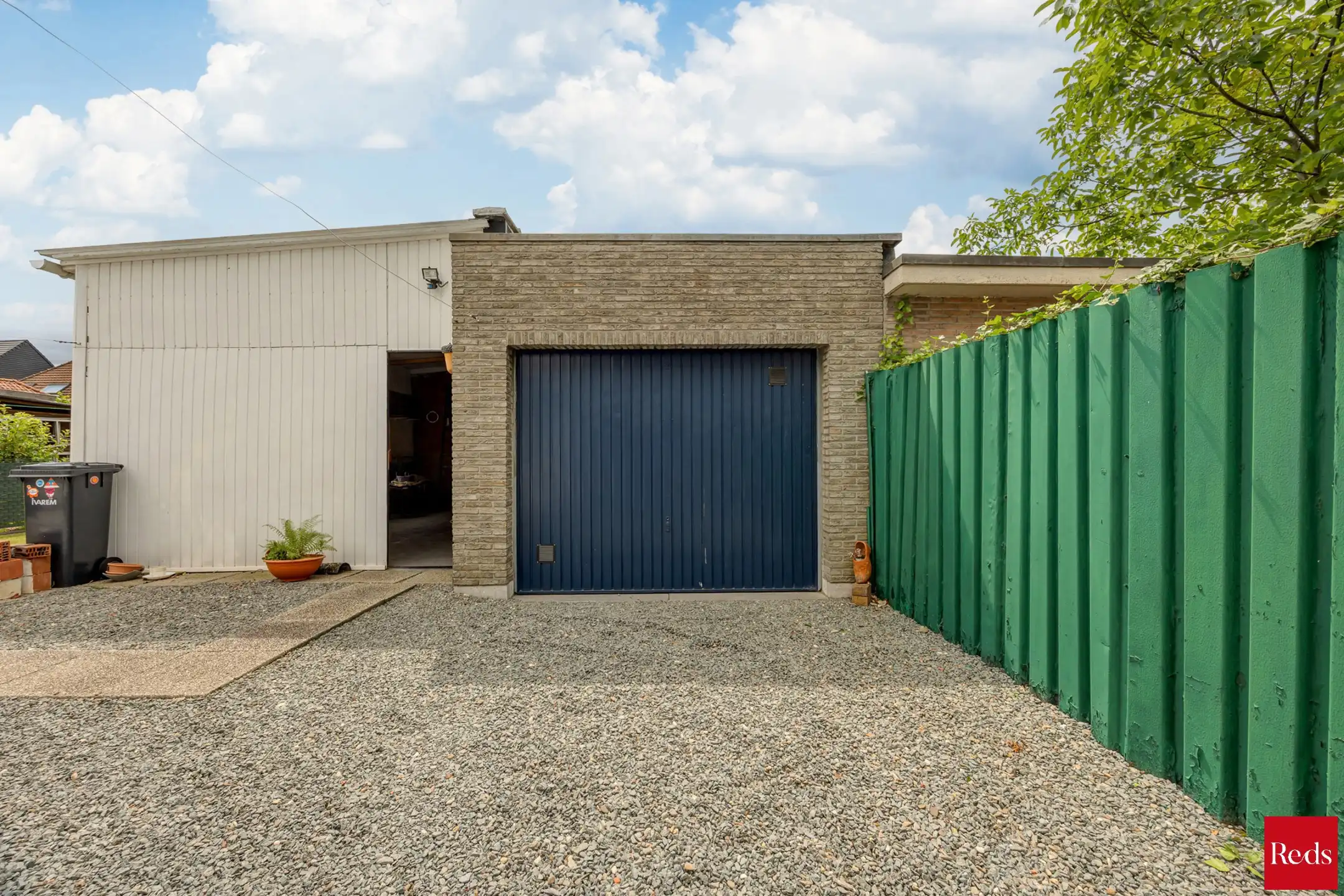  Halfopen bebouwing met tuin en garage foto 18