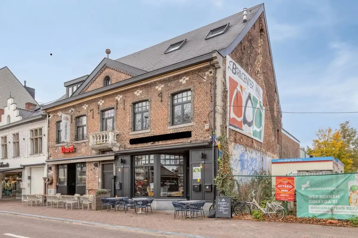 Zeer ruim handelspand met tuin en exclusief triplex  appartement met privé-lift en 2 slaapkamers, garage en staanplaats. foto 40