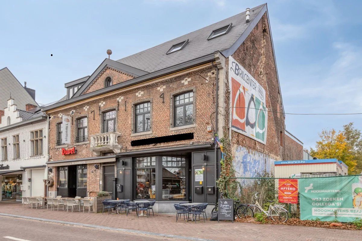 Zeer ruim handelspand met tuin en exclusief triplex  appartement met privé-lift en 2 slaapkamers, garage en staanplaats. foto 40