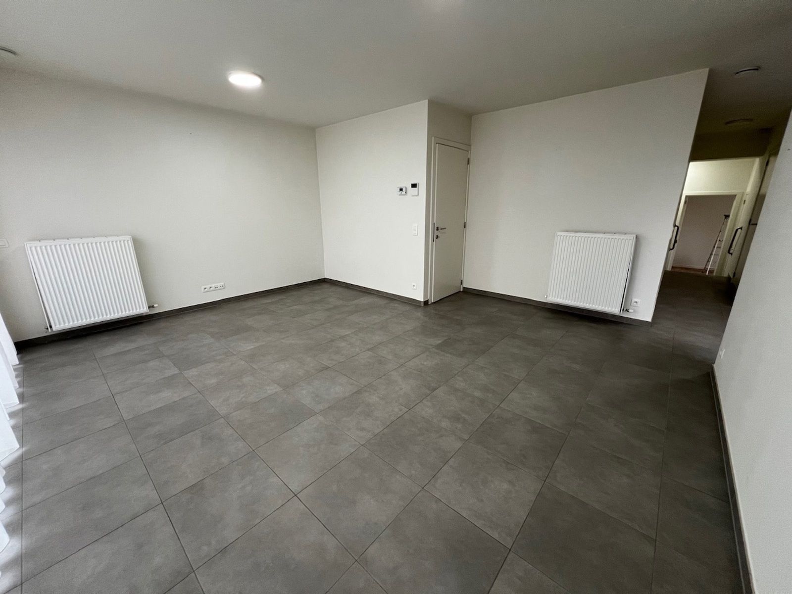 Recent dakapp met 2slpk, terras en parking foto 8