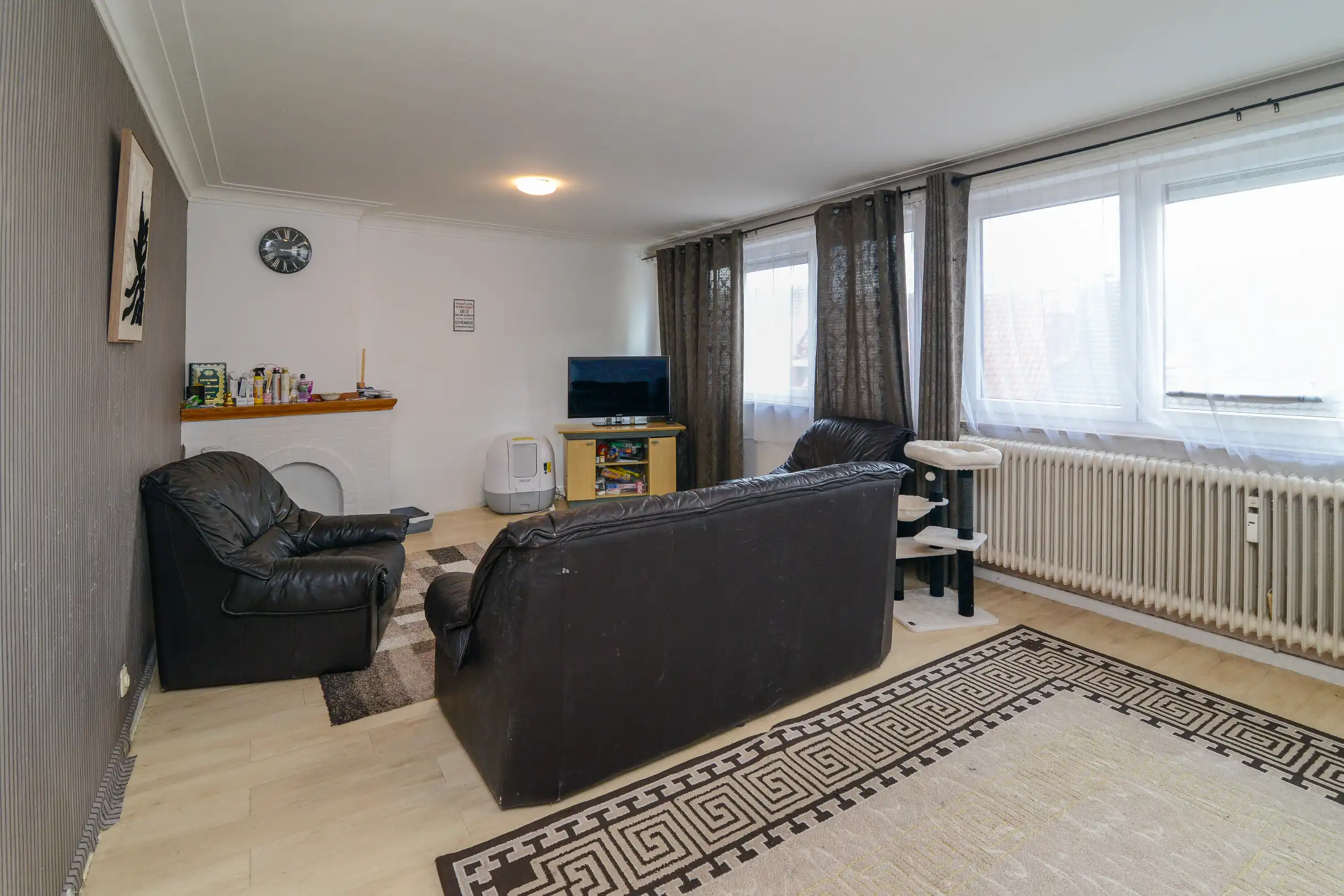 Appartement met 2 slaapkamers + kelderberging te Genk centrum foto 5