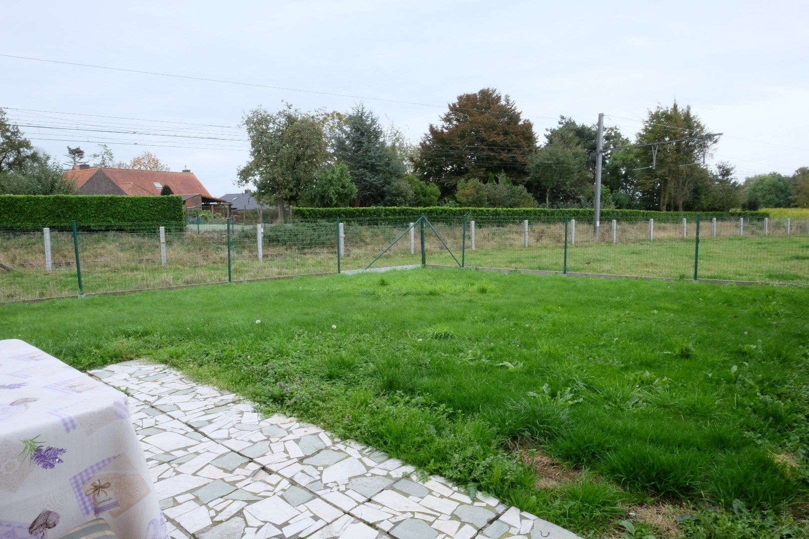 Half open woning met carport  en tuin. foto 6