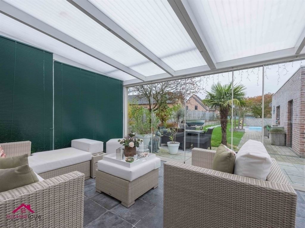 Stijlvolle vrijstaande woning met ruimte voor vrij beroep, garage en verwarmd zwembad op ruim perceel foto 18