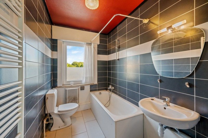 Te renoveren woning met een ruime tuin en zolder – een unieke kans! foto 8