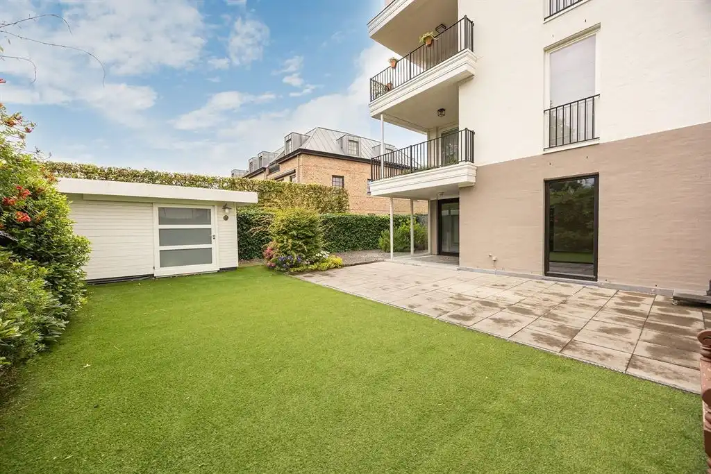Instapklaar gelijkvloers appartement met tuin foto 17