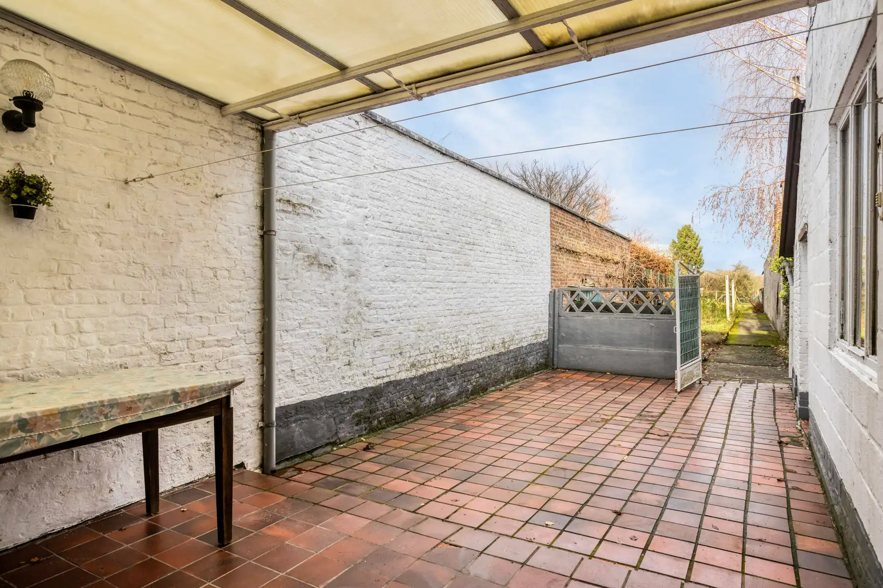 Landelijke driegevelwoning met garage en tuin foto 20