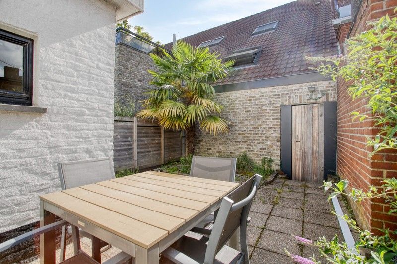Gezellige woning met binnenkoer TE KOOP in het hart van Sint-Eloois-Vijve! foto 3