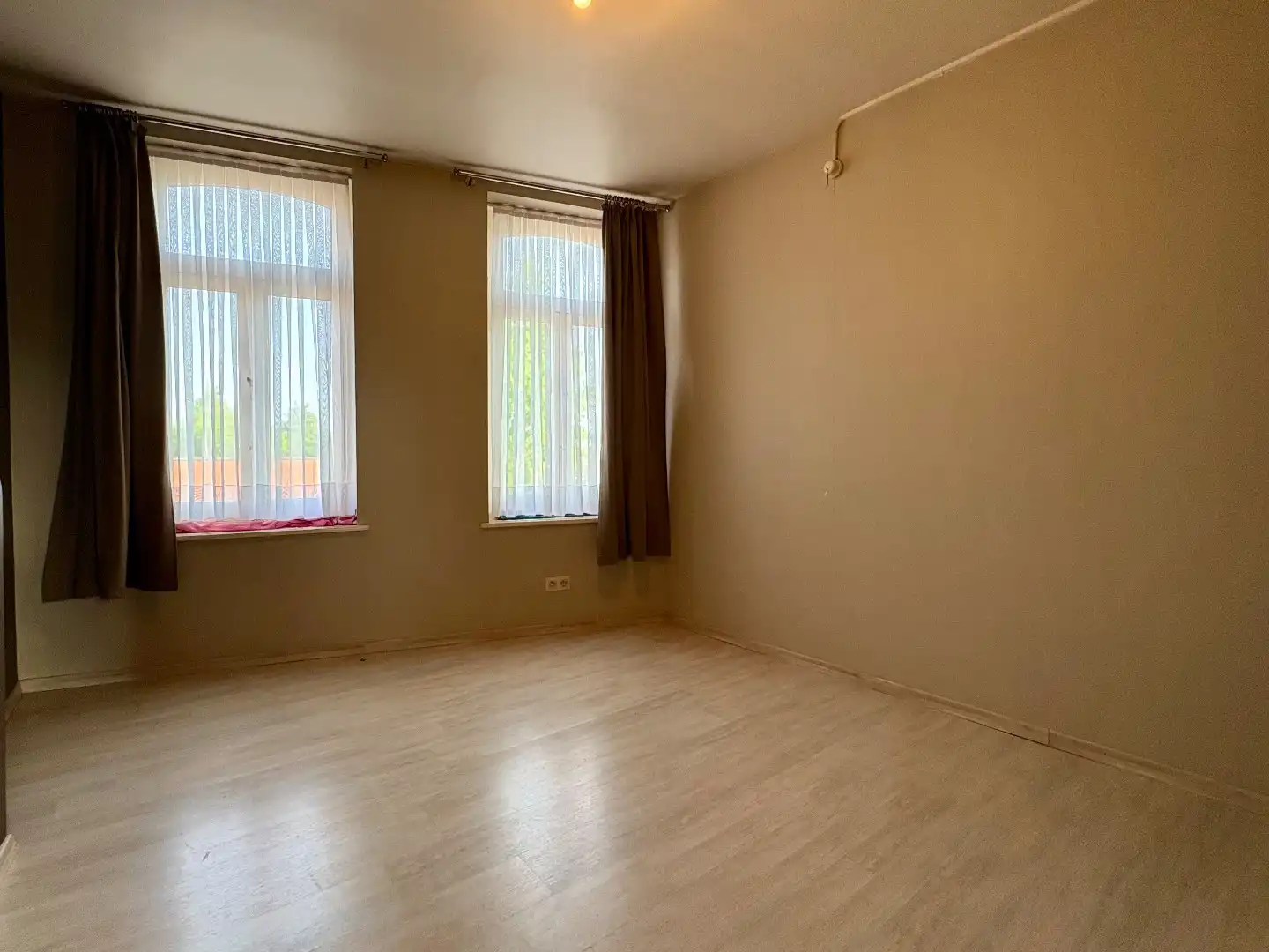 Te renoveren woning met diepe tuin te koop in Harelbeke foto 11