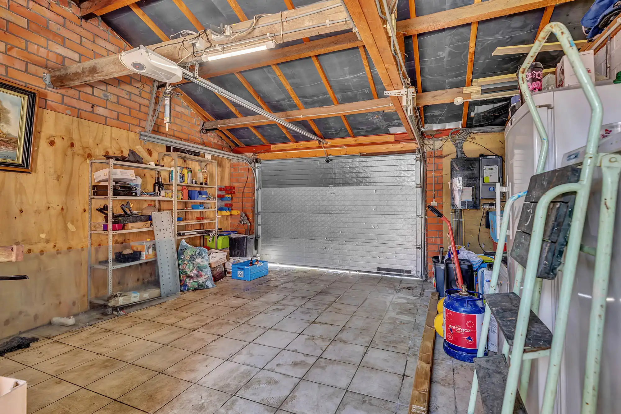 Te renoveren woning met 3 slaapkamers en garage foto 19